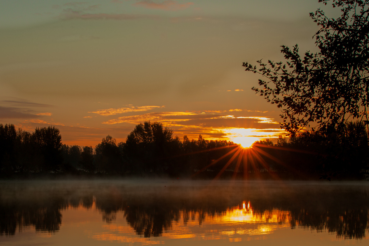 Sunbeams above the lake