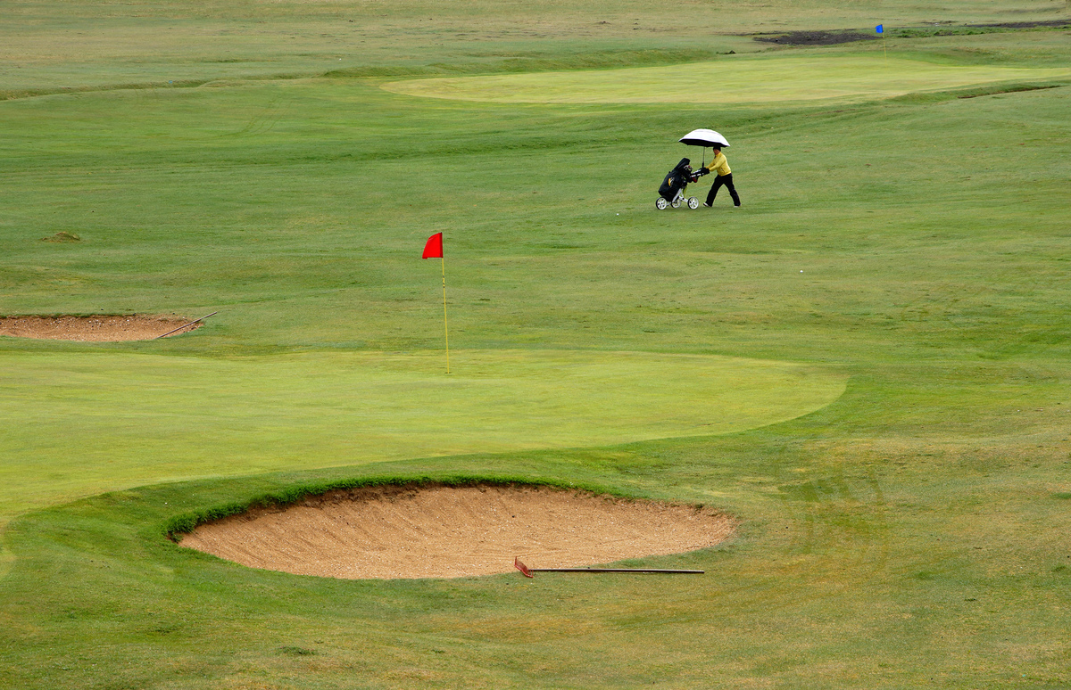 Гольф під дощем