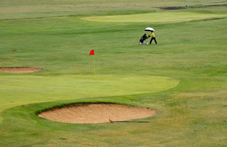 Гольф під дощем