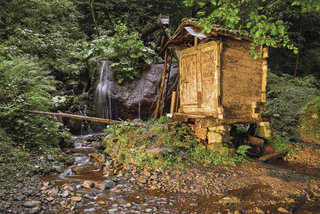 Abandoned mill in the mountains_light brush