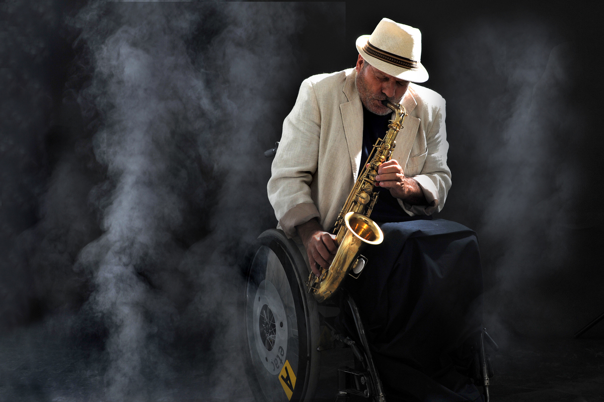 the wheel chair saxophonist 16