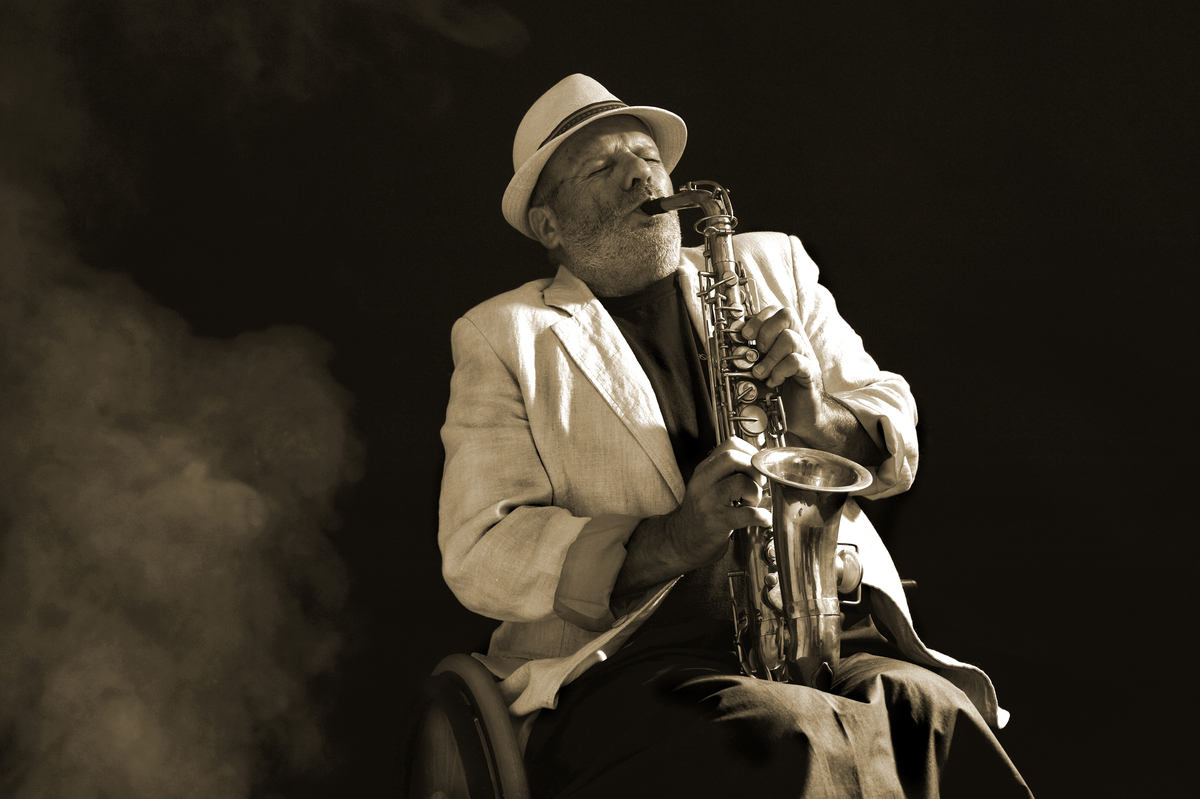 the wheel chair saxophonist 94