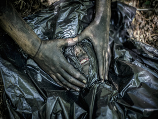 Ukrainian training camp. Scouts practice to hide and survive in the forest area