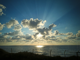 За облаками