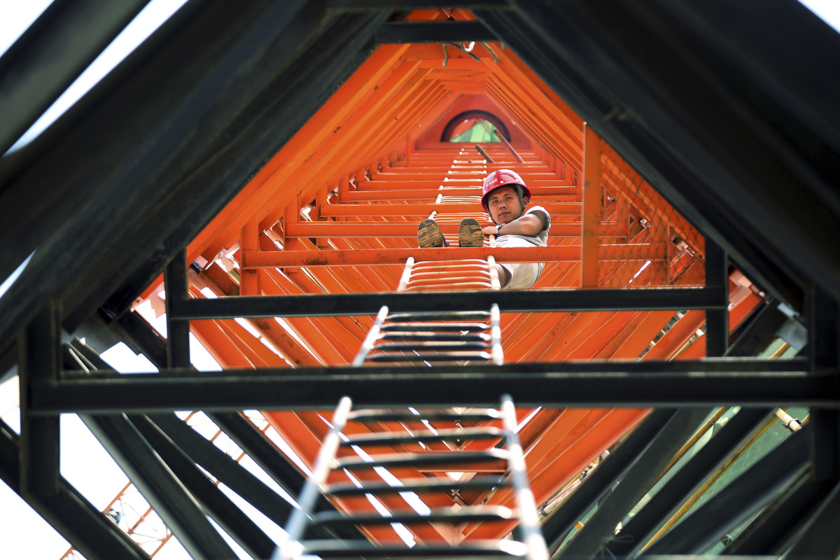 Tower crane workers at hot day