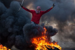 The bird is over the fire