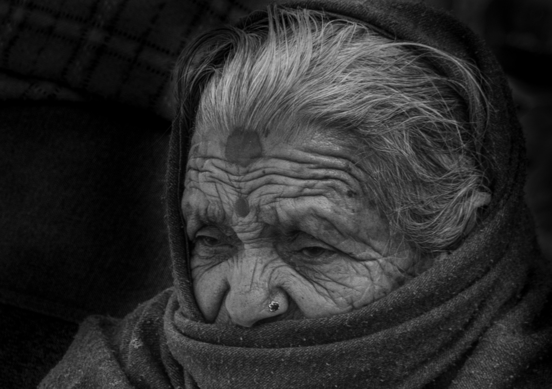 The old woman suffering cold wind