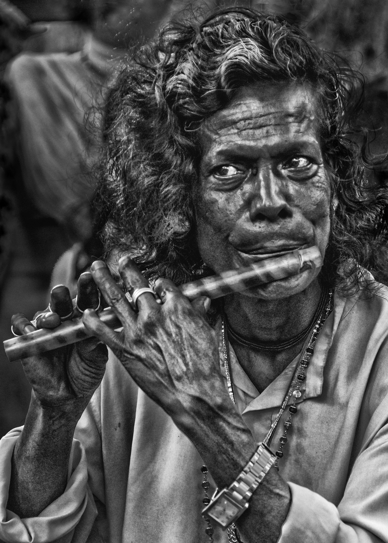 FLUTE PLAYER