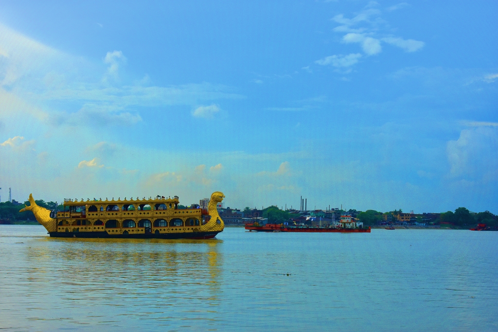 DECORATED BOAT ON RIVER