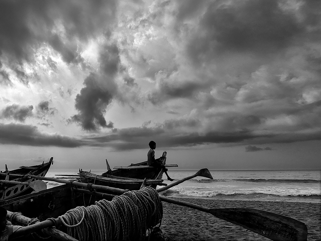 A LONE BOY AND THE SEA