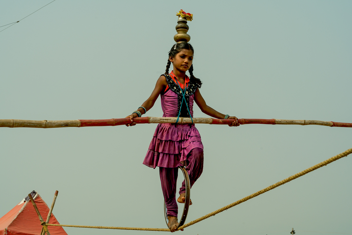Little girl on balance act