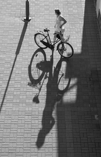 Велосипедистка