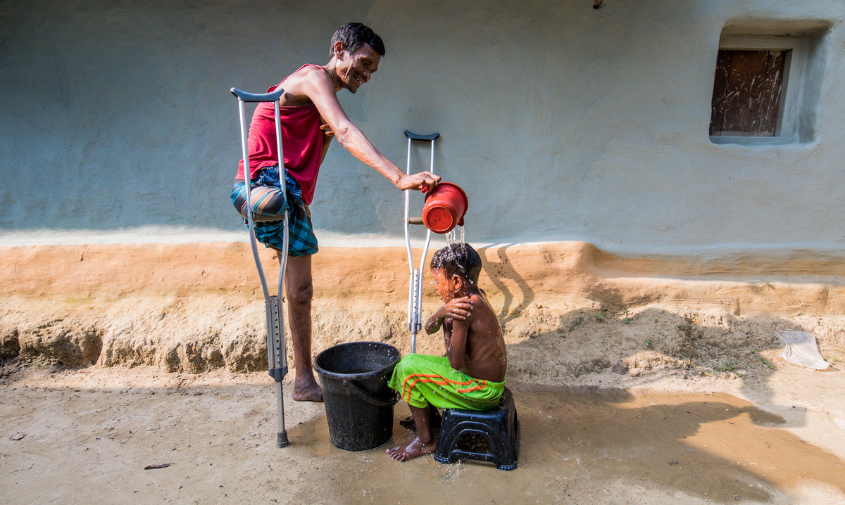 Sultan Ahmed Niloy / A disabled but Caring father of a child