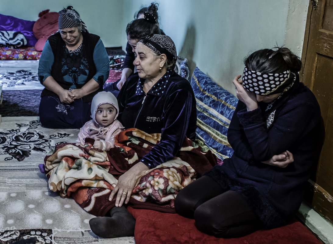 A sister cries for her martyred brother