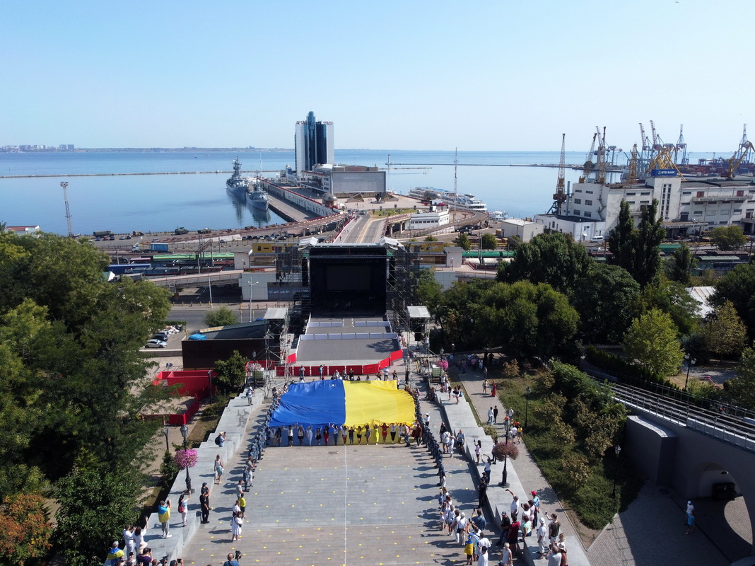 Drone view of the 30-meter flag of Ukraine, the Marine Station and the Potemkin Stairs 08/24/2021
