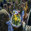 Ukrainian soldiers hold the coffin with Valentin Borisovych Matveyenko, a soldier killed in the Bakhmut combats