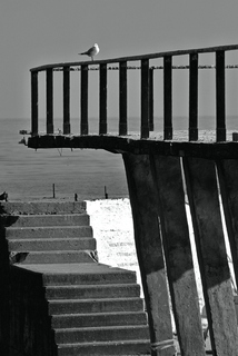 Переможець